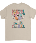 Grafisk t-shirt med färgglatt ryggtryck i cartoon-stil på beige tyg