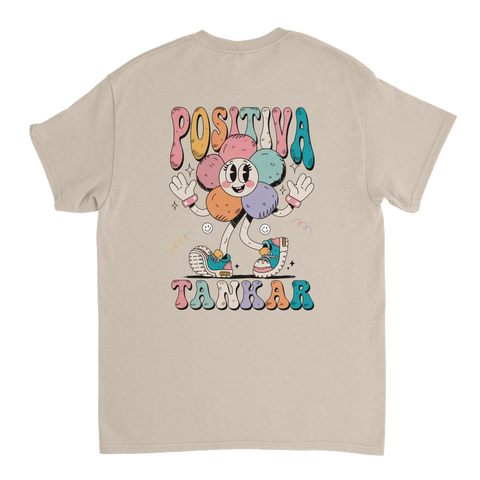 Grafisk t-shirt med färgglatt ryggtryck i cartoon-stil på beige tyg