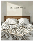 Närbild på en konstposter föreställande en säng med röriga lakan och solljus som faller på väggen bakom.