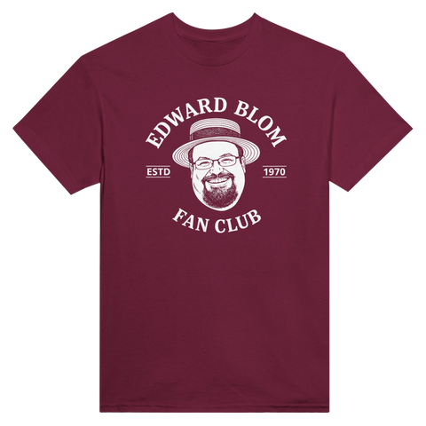 Edward Blom Fan Club-tryck med karikatyr av Blom i stråhatt, på vinröd T-shirt.