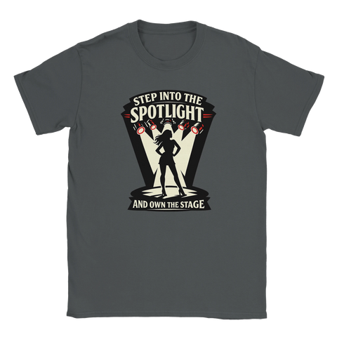 Svart silhuett av kvinna i rampljus med text "STEP INTO THE SPOTLIGHT AND OWN THE STAGE" på mörkgrå t-shirt.