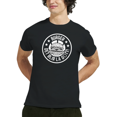 Svart t-shirt med vitt retro-tryck av en hamburgare och text "BURGER DET BLIR LA GÖTT!".