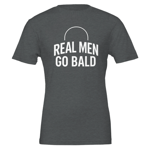 Real men go bald" text med skallig huvud-ikon på mörkgrå t-shirt.