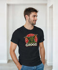 Leende man i en t-shirt med ett kaxigt monsteremblem och texten Grogg