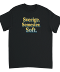 Vintage inspirerad textdesign i gult och blått på en svart t-shirt
