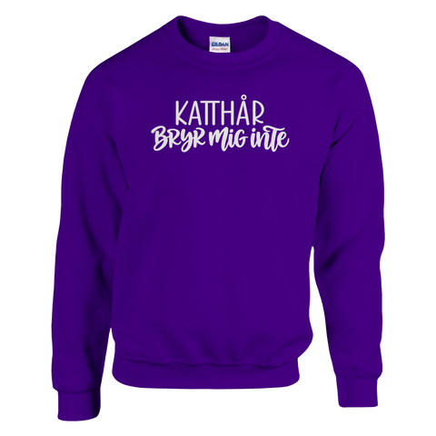 Lila sweatshirt med texten ”Katthår – bryr mig inte”.