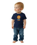 Tecknat lejonhuvud med text "BABY LION" på marinblå baby t-shirt.