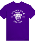 Edward Blom Fan Club-tryck med karikatyr av Blom i stråhatt, på lila T-shirt.