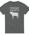 Typiskt Schlätta" text och ko-silhuett i vitt på mörkgrå t-shirt.