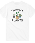Grafisk illustration av tre krukväxter med texten I wet my plants på vit t-shirt