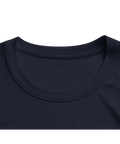 Mörkblå ekologisk oversized t-shirt med diskret Shirty-logga i nacken.