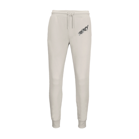 Shirty" logga i grå/svart graffiti-stil på beige joggingbyxor med resår och dragsko.