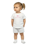 Diaper Status laddningsikon i rosa på vit baby t-shirt.