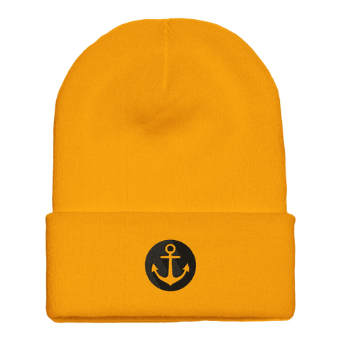 Gul mössa med mudd och broderat ankare