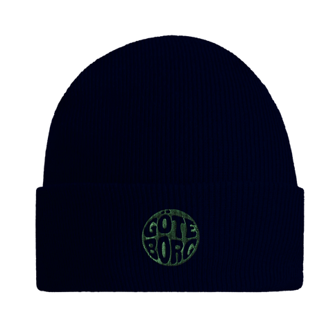 Mössa med grön cirkel och texten Göteborg utstansad