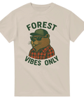 Beige t-shirt med tecknad bäver i skjorta och solglasögon samt texten "Forest Vibes Only"